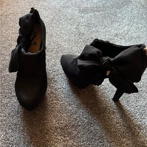 Dressy ankle booties with high heel. Worn once.